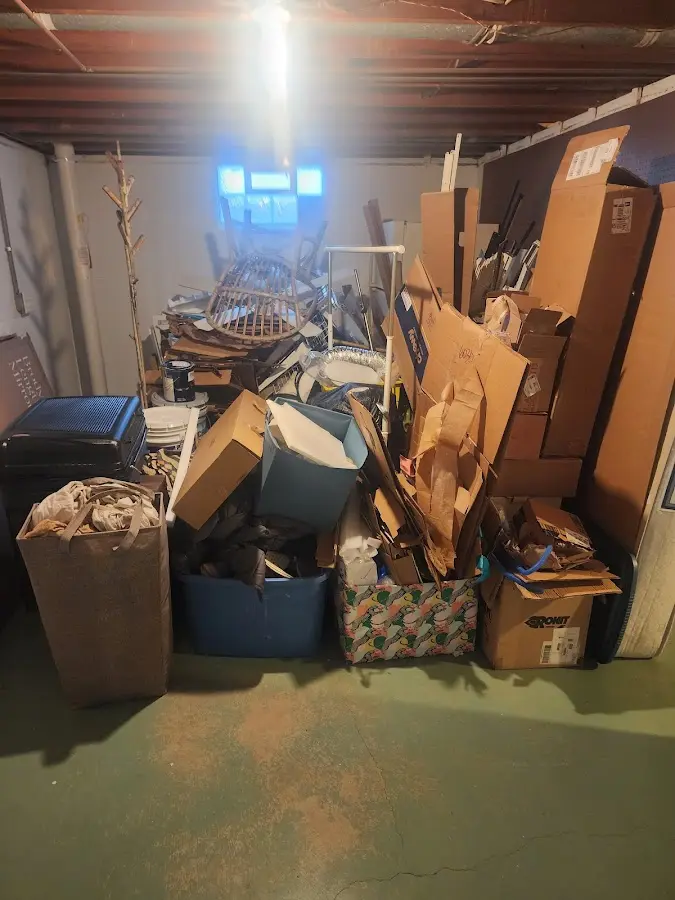 Roll-off dumpster container at job site for 2 Yard Dumpster Rental in Hawaiian Acres